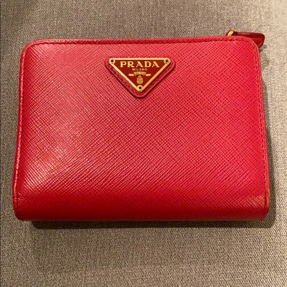 Prada Handbags - Prada Saffiano leather wallet in fiery red
